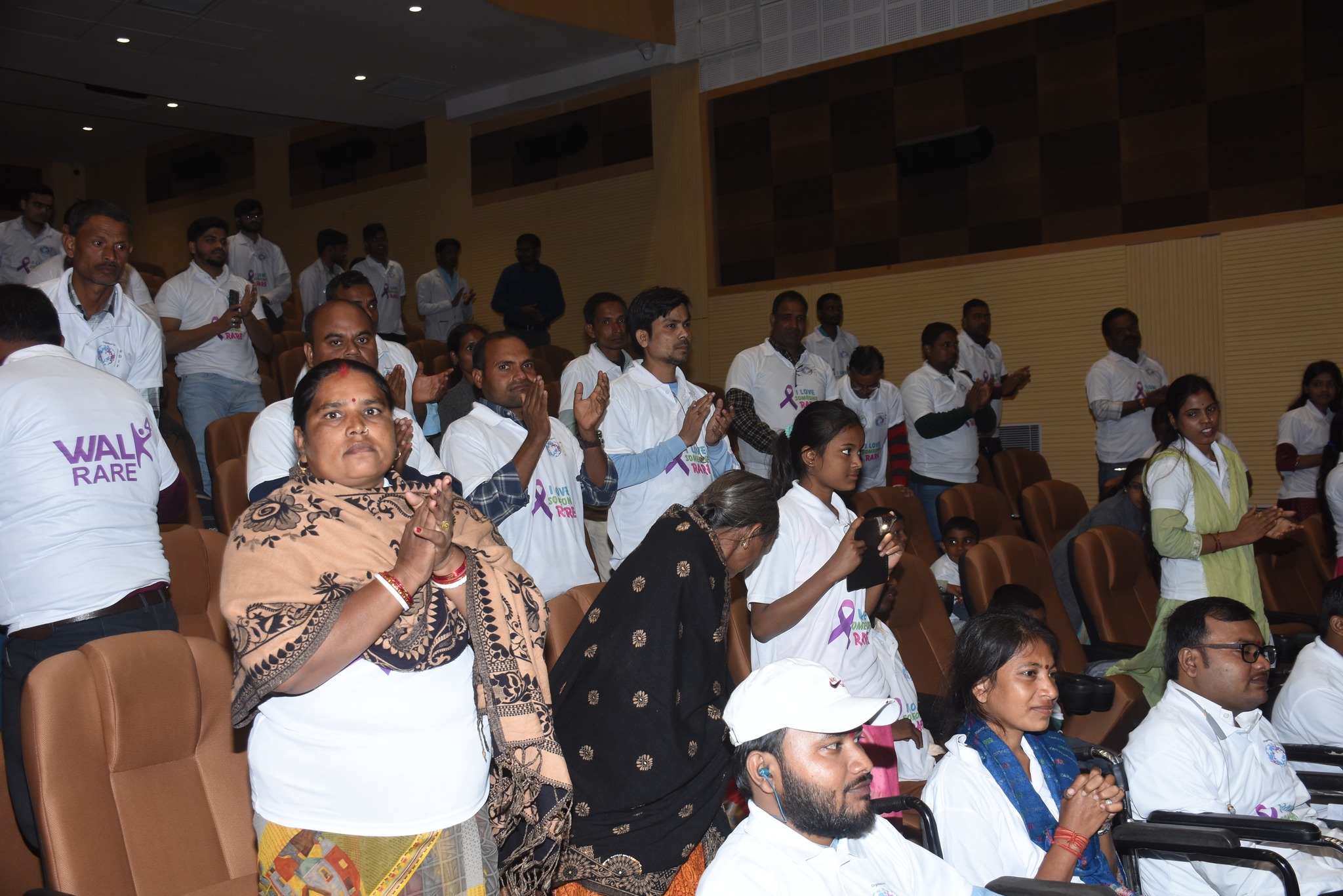 An organizer being interviewed by local media in Patna.